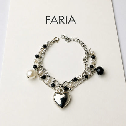 Celeste Heart Charm Bracelet